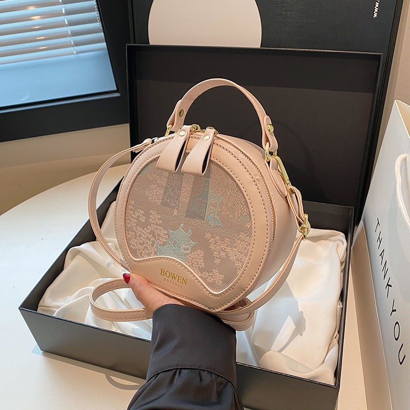 New high end Chinese style crossbody bag with trend multiple functions suitable for commuting Handheld designer small round leisure bag shoulder bag c