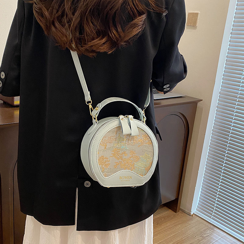 New high end Chinese style crossbody bag with trend multiple functions suitable for commuting Handheld designer small round leisure bag shoulder bag c