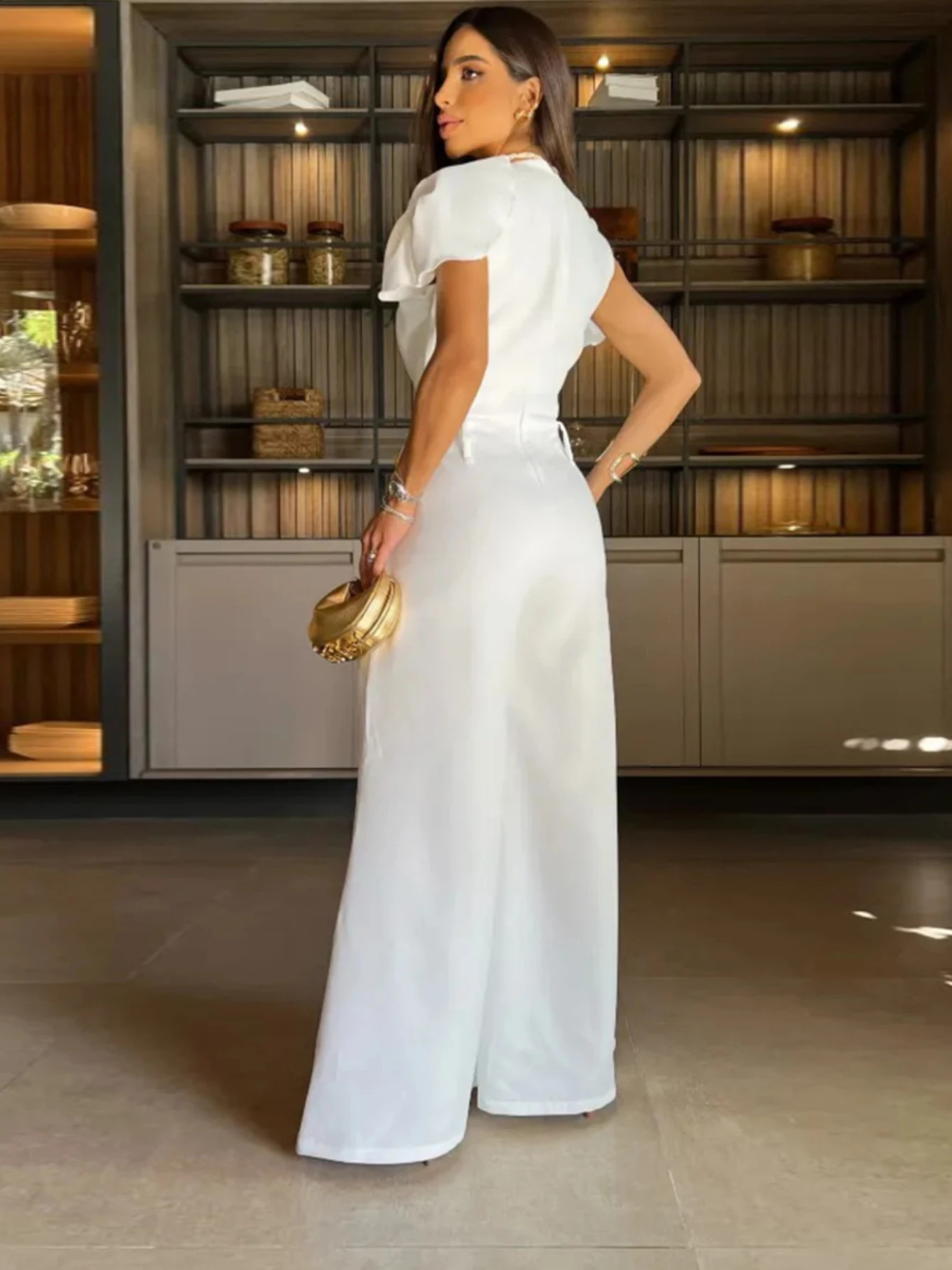 Elegant solid hole button womens jumpsuit O-neck butterfly sleeves loose pants one-piece set summer womens fashionable tight fitting clothes 241115