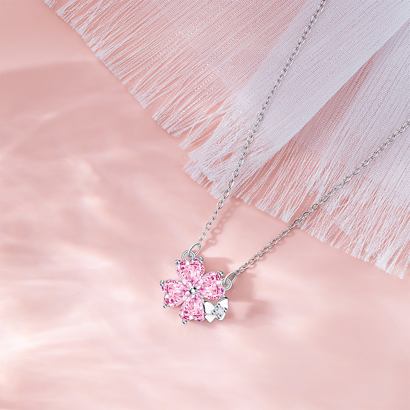 Chic Female Necklace Featuring a Pink Zircon Blossom Pendant - Sleek Stainless Steel Locket Ideal for Commute