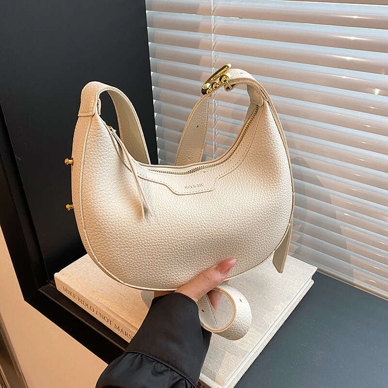 Korean niche half moon women's 2024 new versatile single shoulder crossbody saddle casual fashion crescent bag