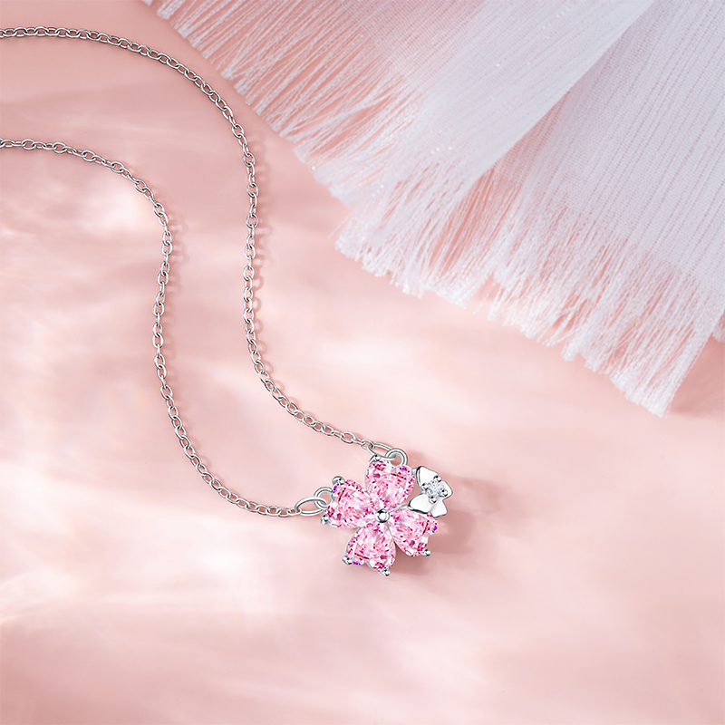 Chic Female Necklace Featuring a Pink Zircon Blossom Pendant - Sleek Stainless Steel Locket Ideal for Commute