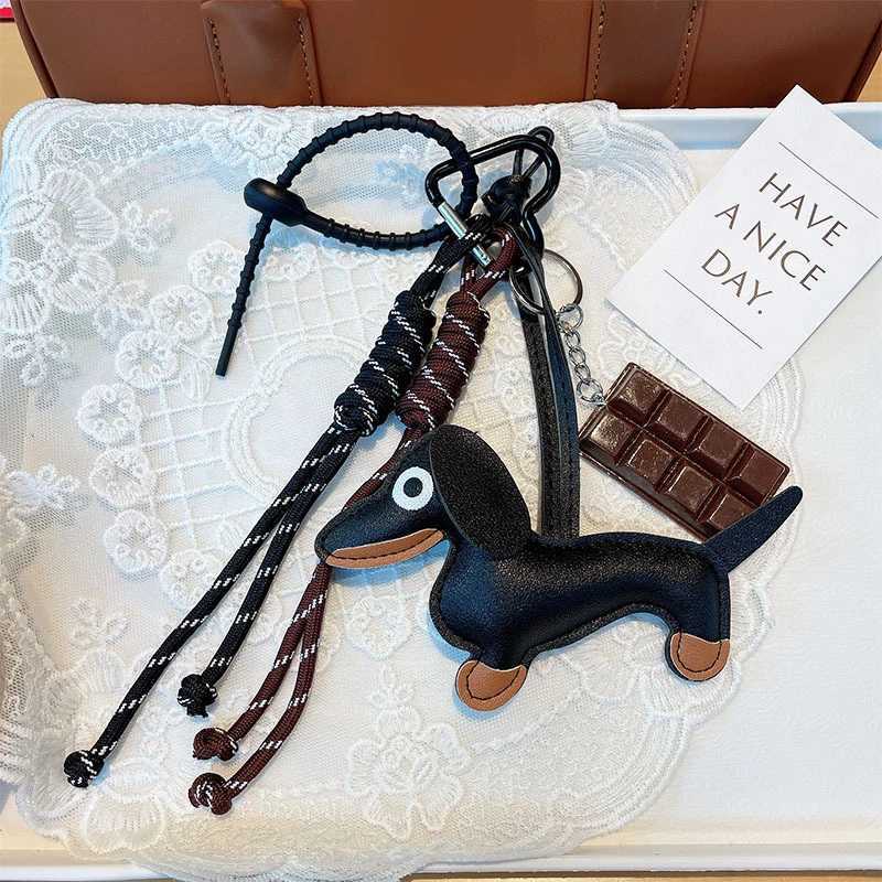 Keychains Lanyards Vintage Sausage Dog Car Wiener Keychain Bag Pendant Hanging Rope Chocolate Weaving Accessories Jewelry Chain Keyring H241119