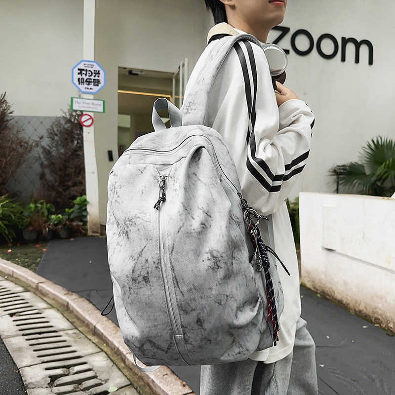 Backpack men's simple large capacity backpack women's leisure junior middle school students high school students schoolbag men 241120