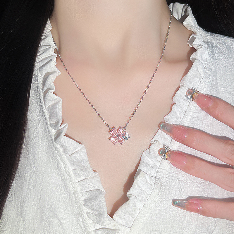 Chic Female Necklace Featuring a Pink Zircon Blossom Pendant - Sleek Stainless Steel Locket Ideal for Commute