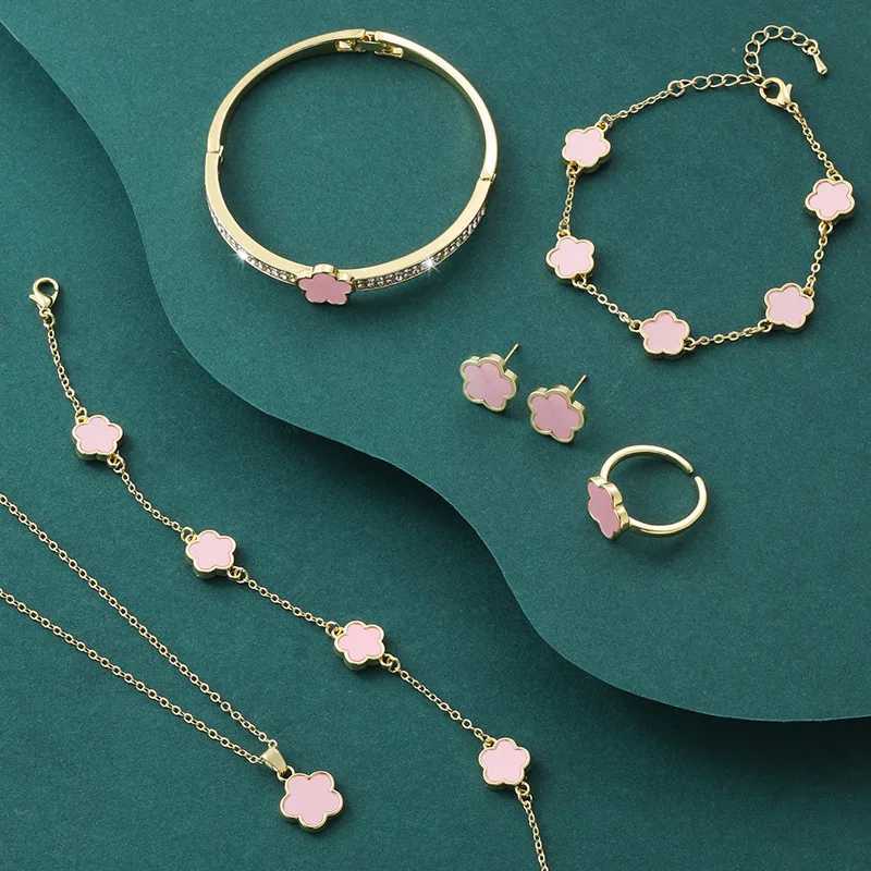 Bracelet Necklace 5 pieces of luxurious five leaf flower jewelry set suitable for women in 2024. Sparkling CZ bracelets necklaces earrings charming cl