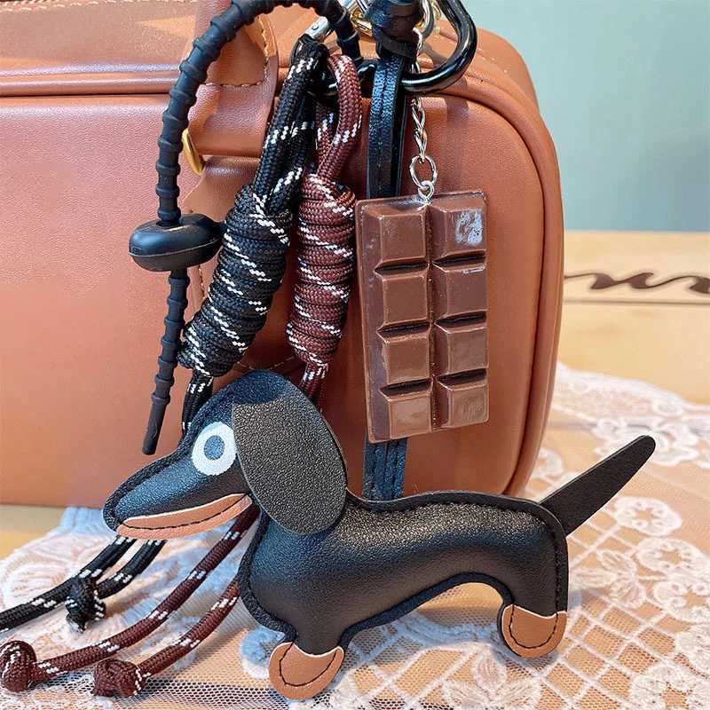 Keychains Lanyards Vintage Sausage Dog Car Wiener Keychain Bag Pendant Hanging Rope Chocolate Weaving Accessories Jewelry Chain Keyring H241119