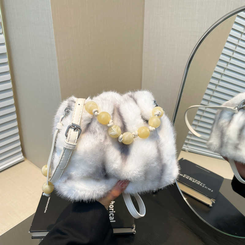 2024 autumn and winter new imitation mink fur bag, women's leopard print crossbody bucket bag, niche handbag, plush bag 241120