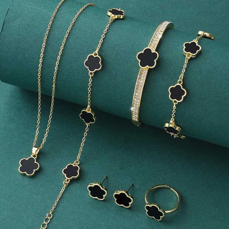 Bracelet Necklace 5 pieces of luxurious five leaf flower jewelry set suitable for women in 2024. Sparkling CZ bracelets necklaces earrings charming cl