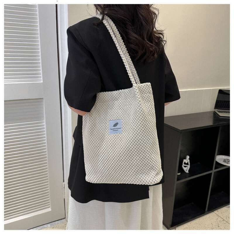 2025 Arts Shoulder For Women New Canvas Bucket Handbags Corduroy Fashion Casual Solid Color Famous Brand Bags