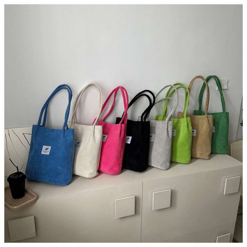 2025 Arts Shoulder For Women New Canvas Bucket Handbags Corduroy Fashion Casual Solid Color Famous Brand Bags