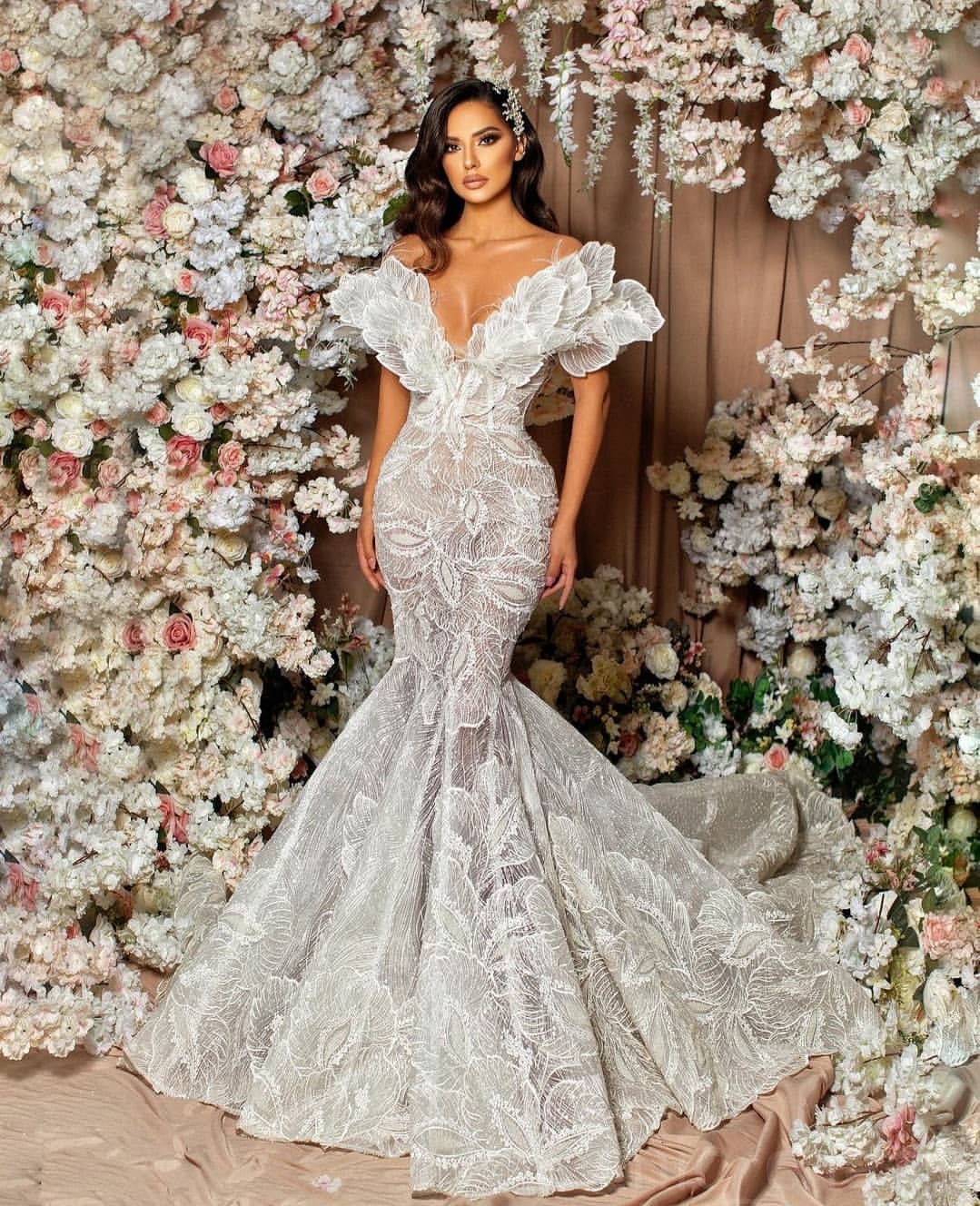 vintage style arabesque lace wedding dress with floral design draped train perfect for your special day