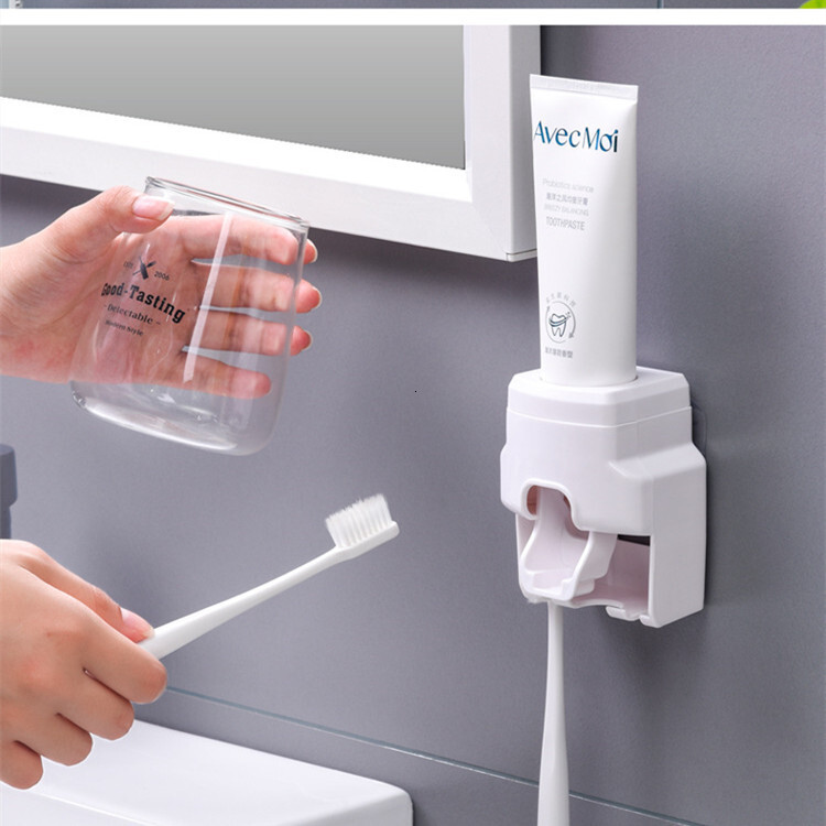 Explosive automatic toothpaste squeezer wall hanging perforation-free toothbrush holder