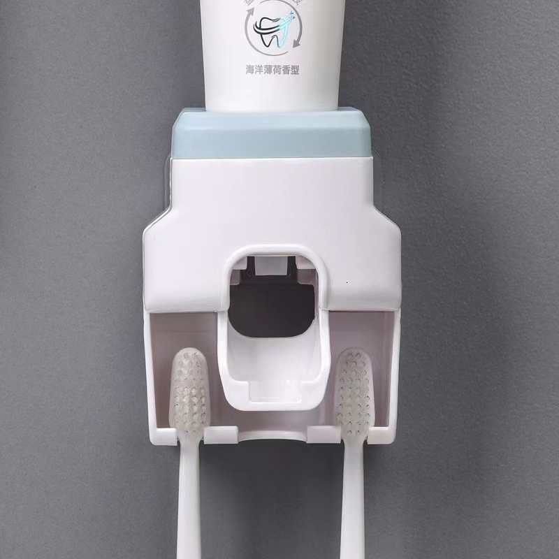 Explosive automatic toothpaste squeezer wall hanging perforation-free toothbrush holder