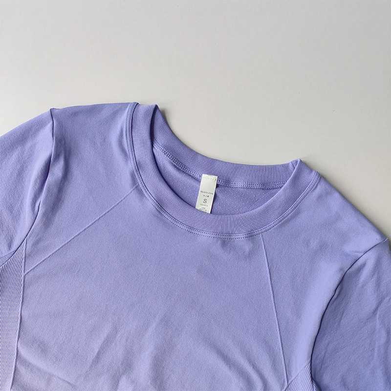 Yoga Top Light Fitting elastic quick drying sports T-shirt suitable for womens personalized fitness short sleeved summer slimming styleXJ250410