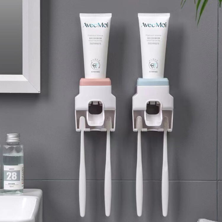 Explosive automatic toothpaste squeezer wall hanging perforation-free toothbrush holder