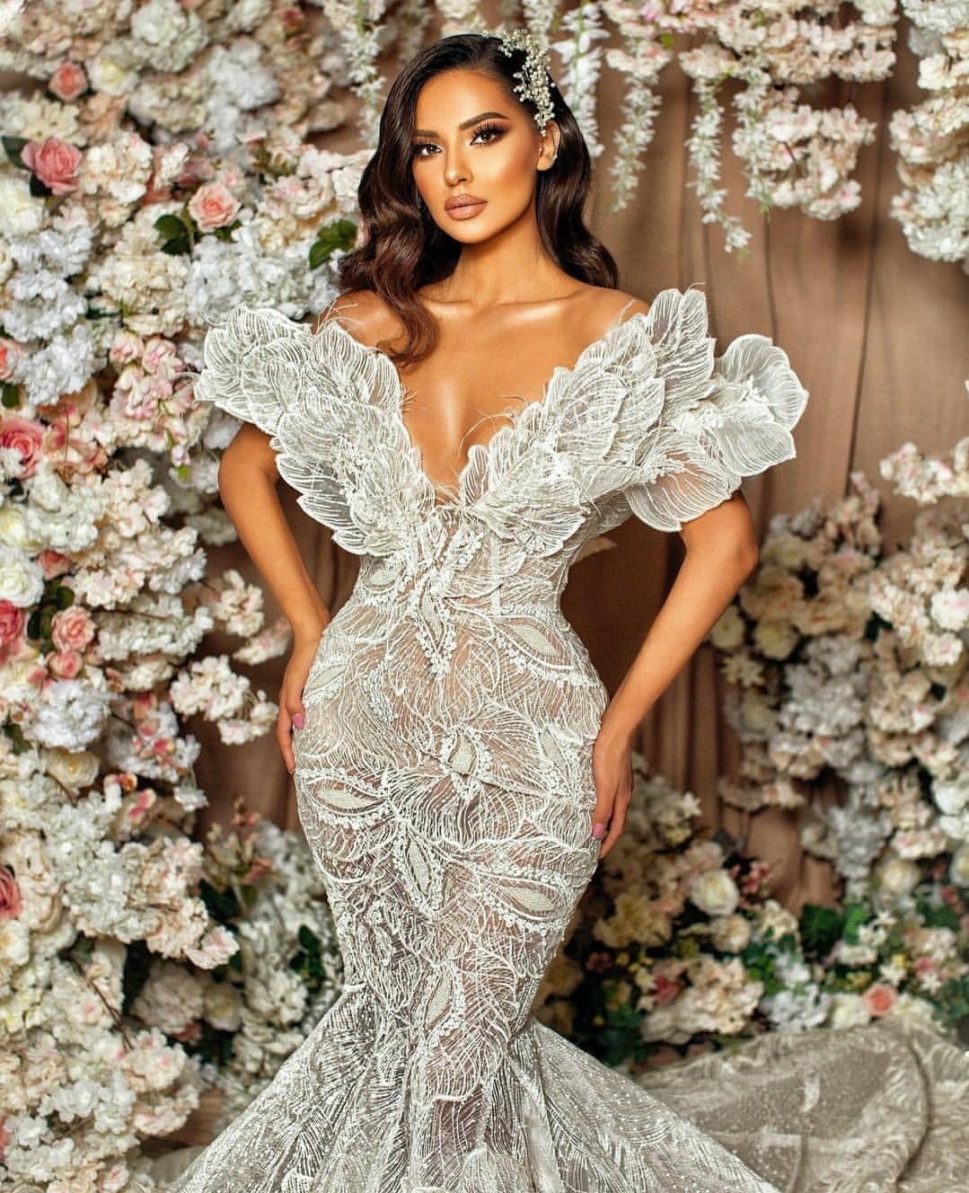 vintage style arabesque lace wedding dress with floral design draped train perfect for your special day