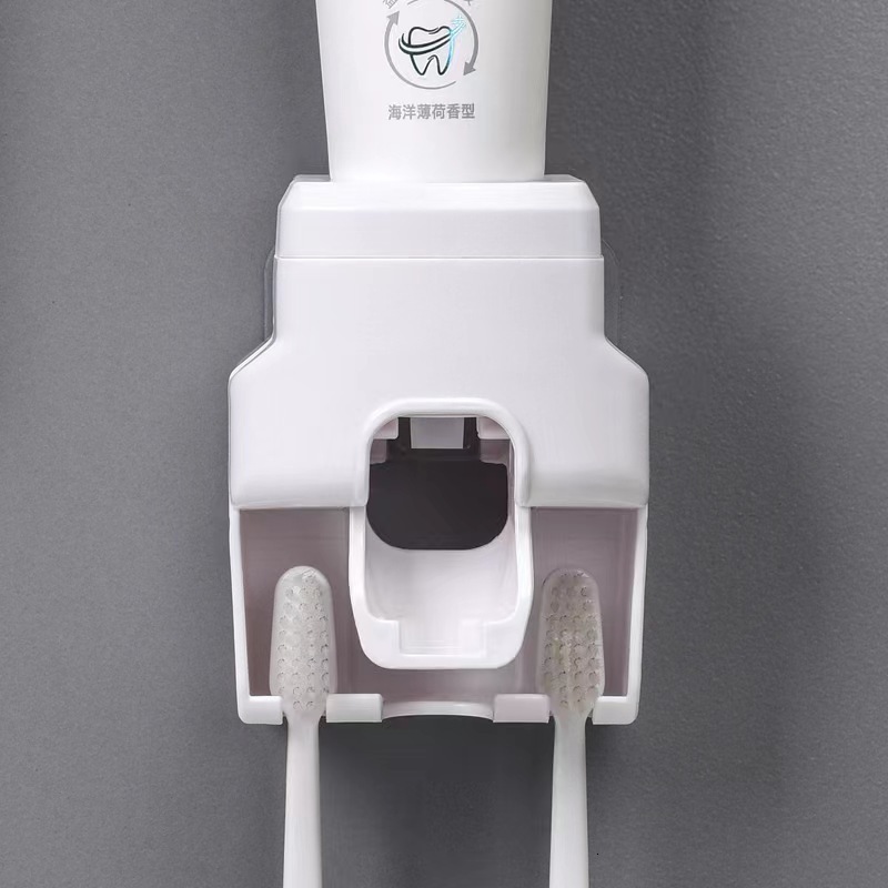 Explosive automatic toothpaste squeezer wall hanging perforation-free toothbrush holder