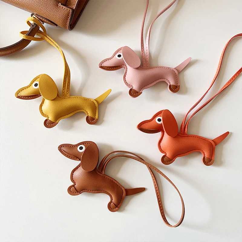 Multi color classic leather small dog keychain pendant cute sausage bag charm mobile phone pendant tripod keyring accessories Y241121