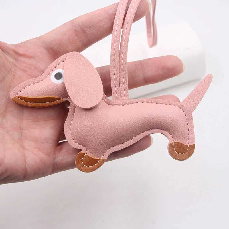 Multi color classic leather small dog keychain pendant cute sausage bag charm mobile phone pendant tripod keyring accessories Y241121