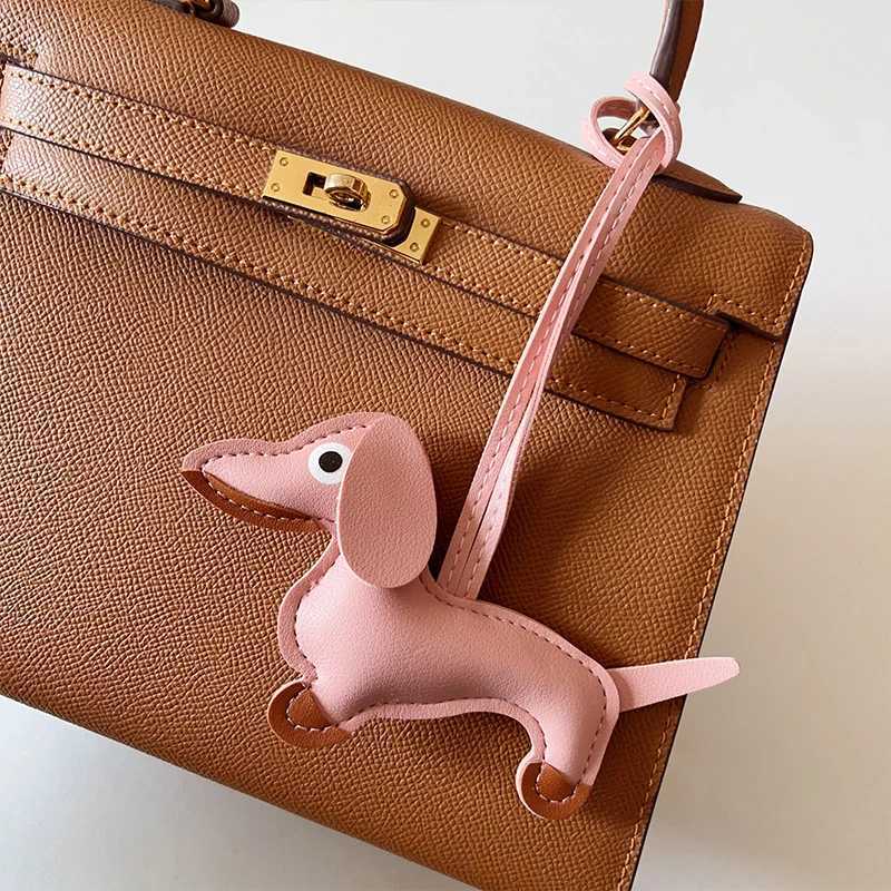 Multi color classic leather small dog keychain pendant cute sausage bag charm mobile phone pendant tripod keyring accessories Y241121