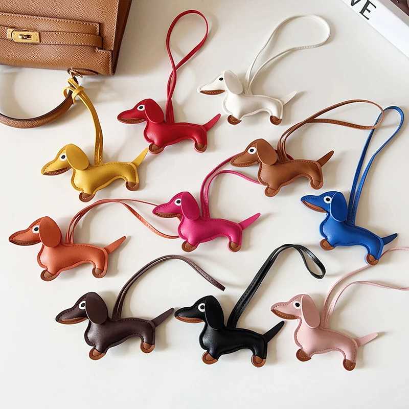 Multi color classic leather small dog keychain pendant cute sausage bag charm mobile phone pendant tripod keyring accessories Y241121
