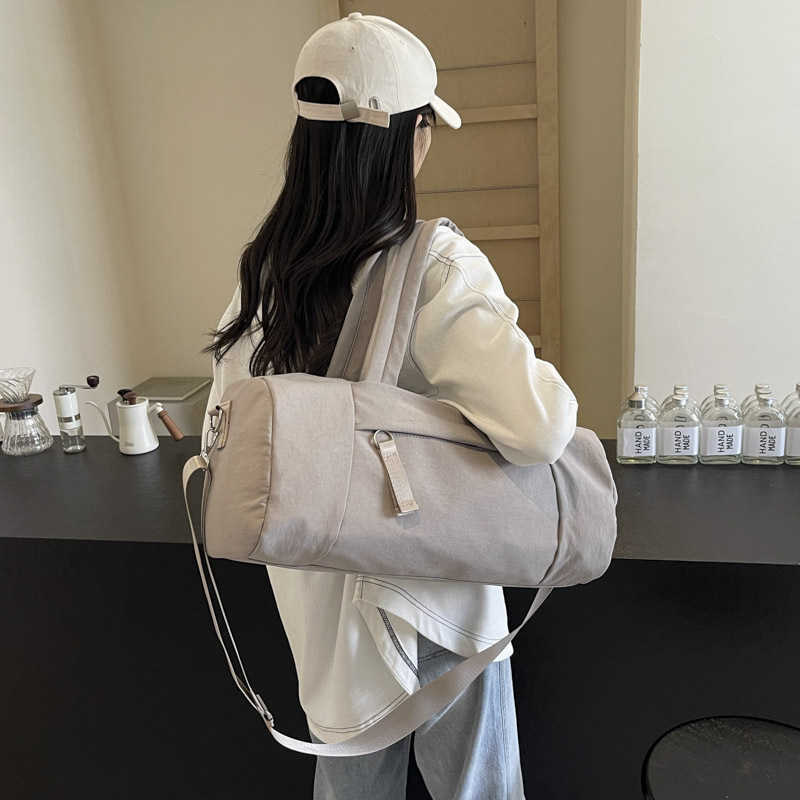 new large capacity travel bag commuting handbag lightweight outdoor sports and fitness womens bag yoga bag cylindrical backpack