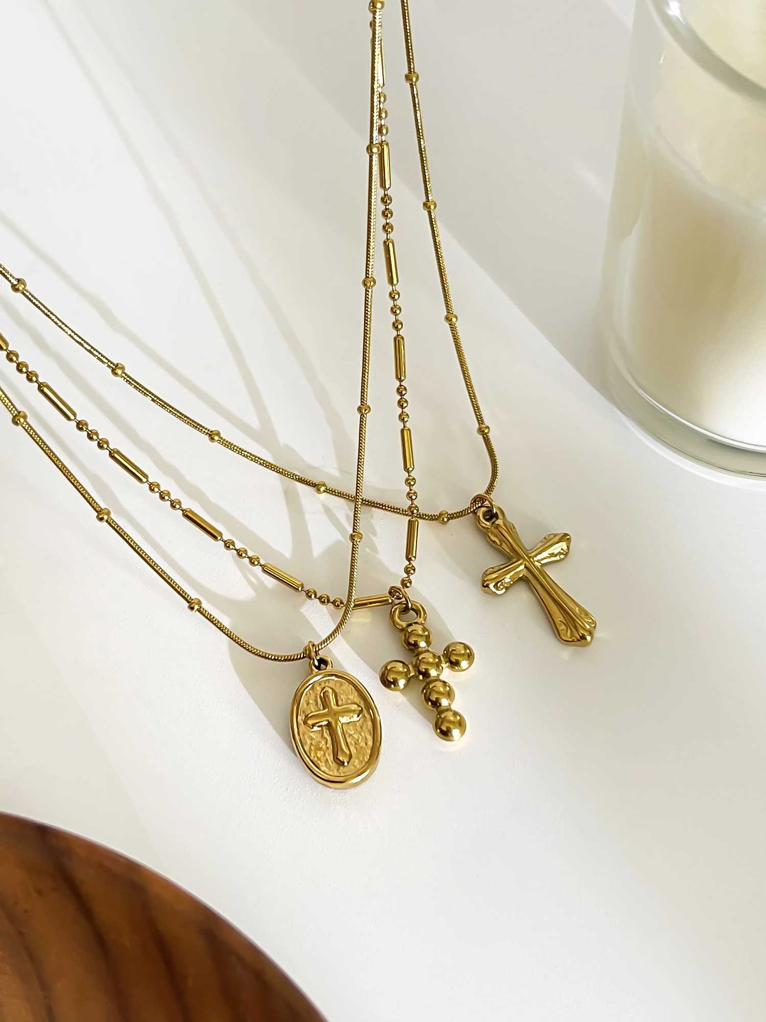 Perisbox stainless steel gold-plated oval round bead metal texture cross pendant necklace suitable for womens creative Tren Collections W241121
