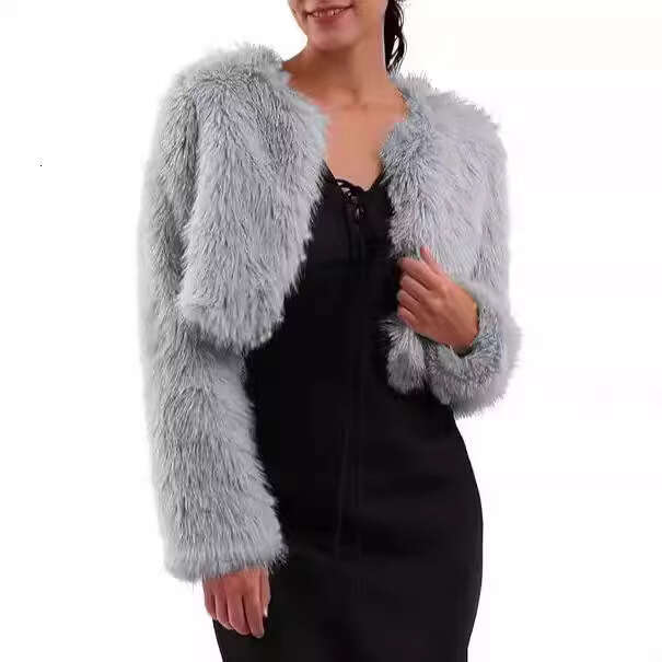 Autumn and winter new artificial long sleeved collarless women's coat top fur plus size