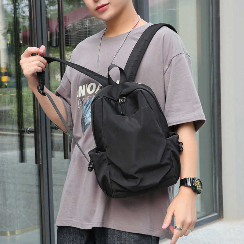 new mini backpack mens small trend light schoolbag simple leisure travel small backpack 241121