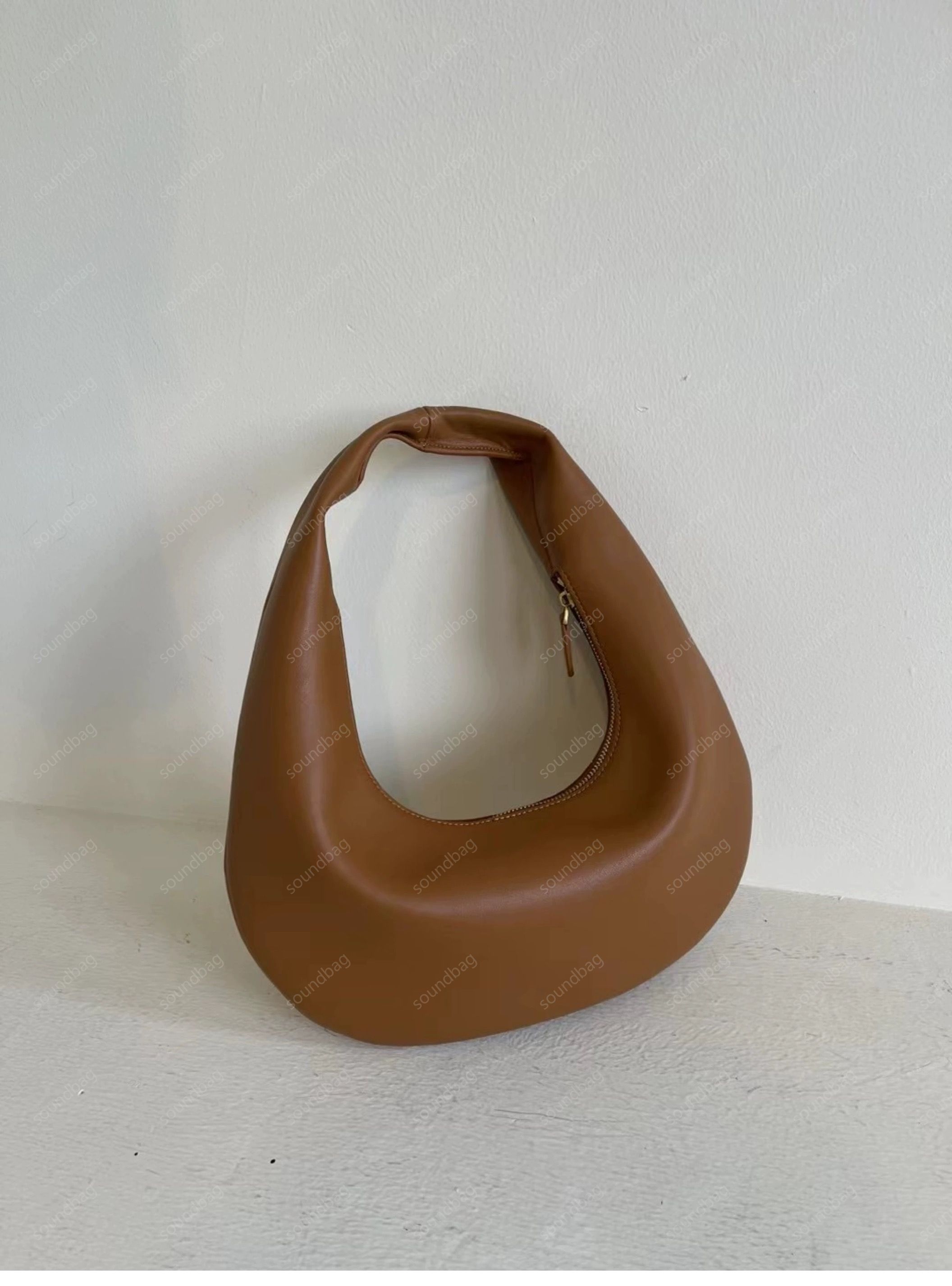 2024 Spring Crescent Moon Bag: Luxurious Genuine Dumpling Tote - Designer Fashion for Women, Minimalist Textured Leather Handbag