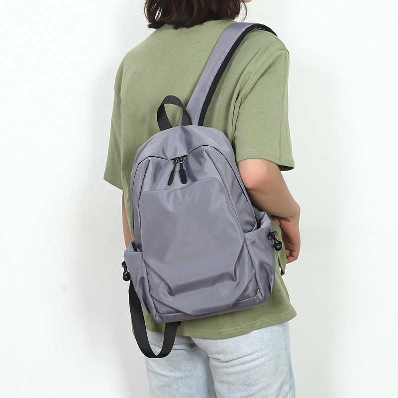 new mini backpack mens small trend light schoolbag simple leisure travel small backpack 241121