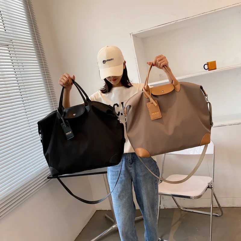 Women Travel Bags Waterproof Womens Sports Female Weekend Gym Portable Bag Multifunctial Lage HandbagXJ241122 dh1102219088