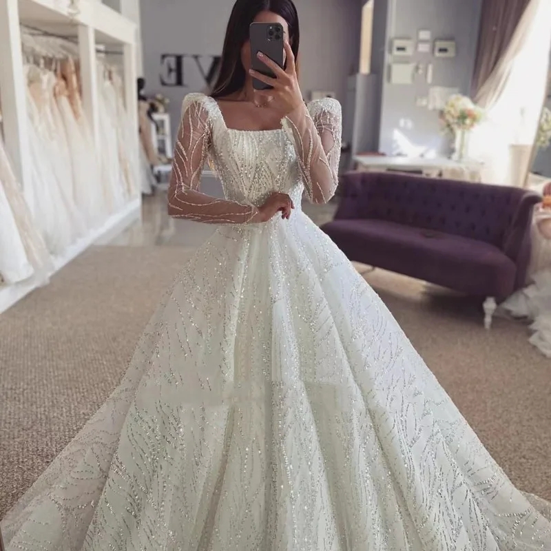 Elegant Sequined Ball Gown Wedding Dress 2025 Boat Neck Long Sleeves Lace-Up A-line Bridal Gowns Vestidos De Novia Arabic Dubai
