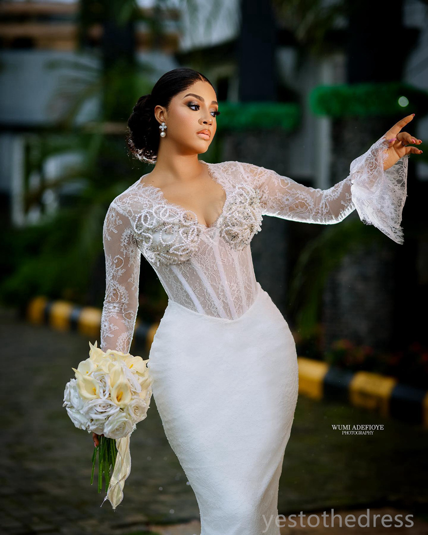2024 Mermaid Wedding Dresses Bridal Gowns Short Wedding Gowns Illusion Long Sleeves Beaded Lace Pearls Decorated Birdal Dress for African Black Bride 