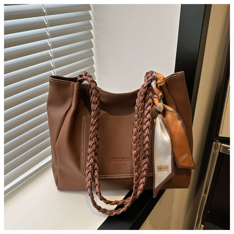 Large capacity solid color western-style silk scarf 2024 new casual women's texture commuting woven strap single shoulder tote bag