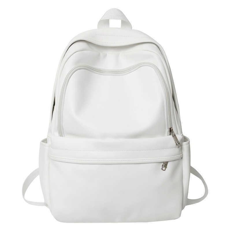 New solid color PU leather backpack with large capacity and versatile design for men, Korean version trendy brand casual backpack for female college s