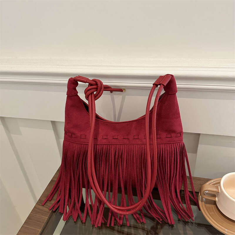 Fashion trend tassel for women, 2024 autumn new casual versatile single shoulder diagonal cross armpit bag