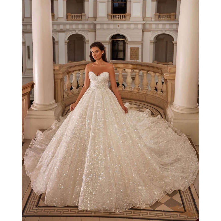 Exquisite Ball Gown Wedding Dress Beaded Appliques Sweetheart Strapless Bride Gowns With Jacket Sleeveless Tulle Bridal Dresses