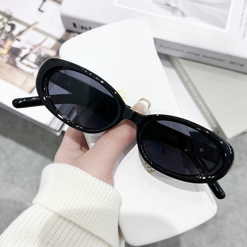 Men and women's new sunglasses women's senior sense small frame cat-eye sunglasses polarizing UV protection star sunglasses of the same type