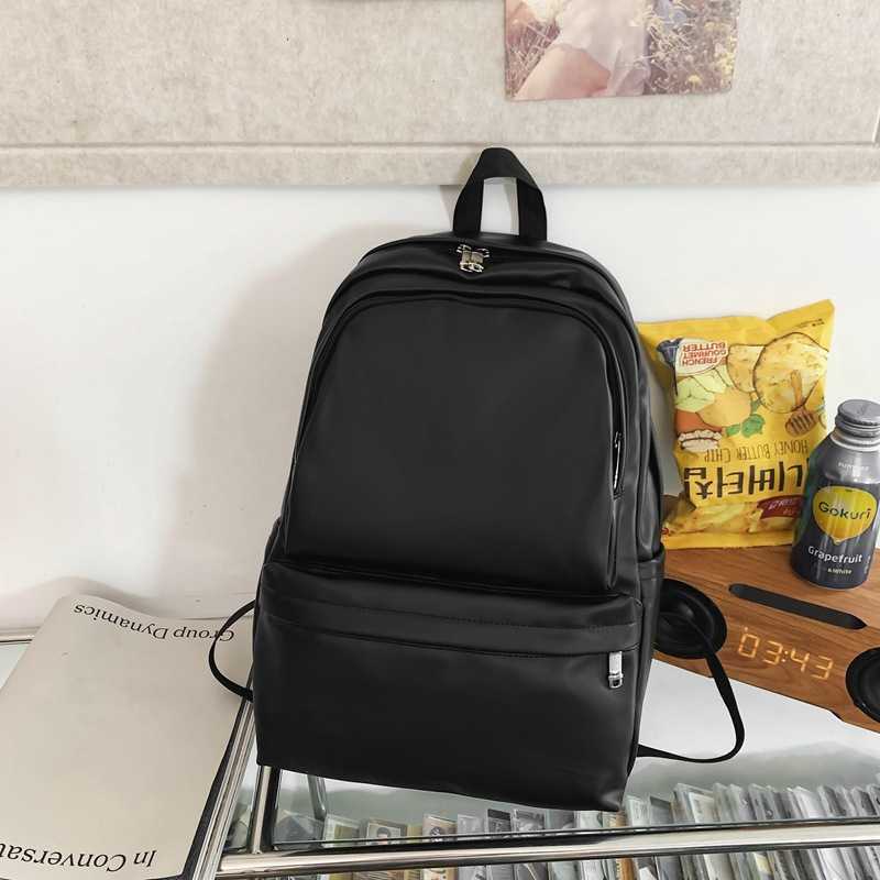 Large capacity and high-value PU stylish backpack for junior and senior high school 2024 new Korean style simple couple fashion travel bag