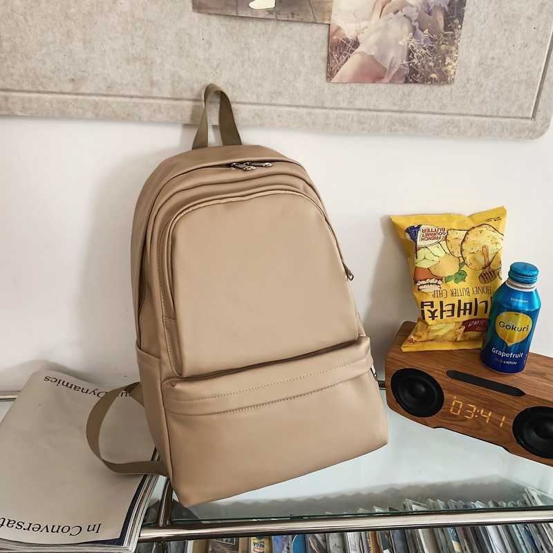 Large capacity and high-value PU stylish backpack for junior and senior high school 2024 new Korean style simple couple fashion travel bag