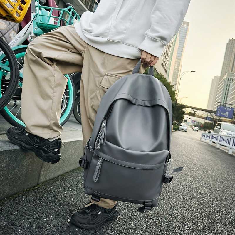 2024 PU backpack men's and women's soft leather business casual large capacity travel computer fashion student double backpack