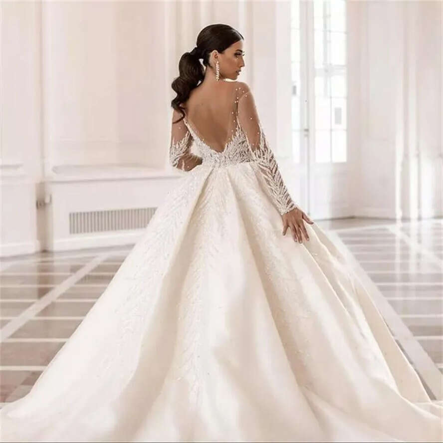 Arabic Dubai Beads Crystals Ball Gown Dresses 2022 Vestido De Noiva Soft Sheer Tulle Long Sleeves Backless Wedding Bridal Gowns