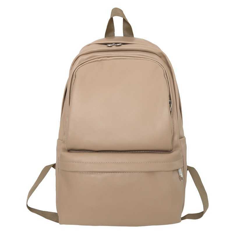 Large capacity and high-value PU stylish backpack for junior and senior high school 2024 new Korean style simple couple fashion travel bag