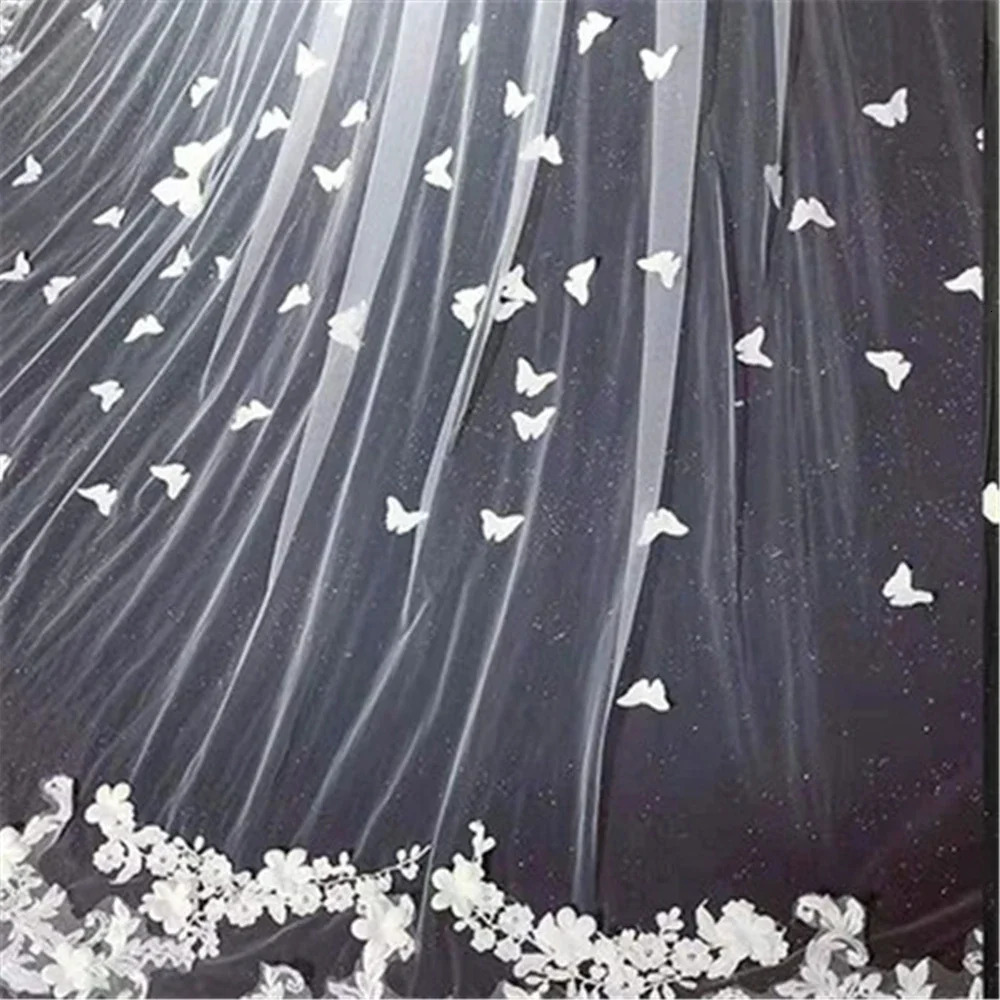Wedding veil with long lace edges and 3D butterfly flower stickers covering the face of the cathedral brides veil with a comb Velo de Novia white ivor
