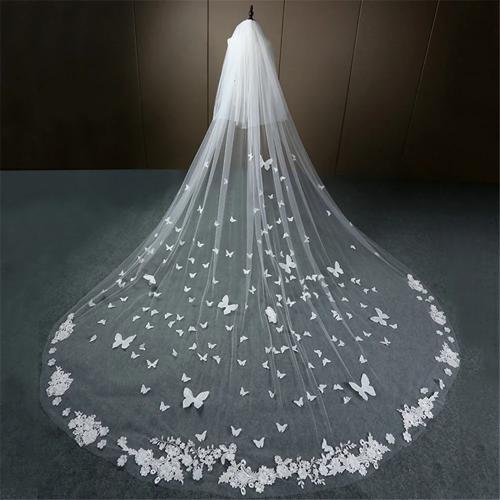 Wedding veil with long lace edges and 3D butterfly flower stickers covering the face of the cathedral brides veil with a comb Velo de Novia white ivor