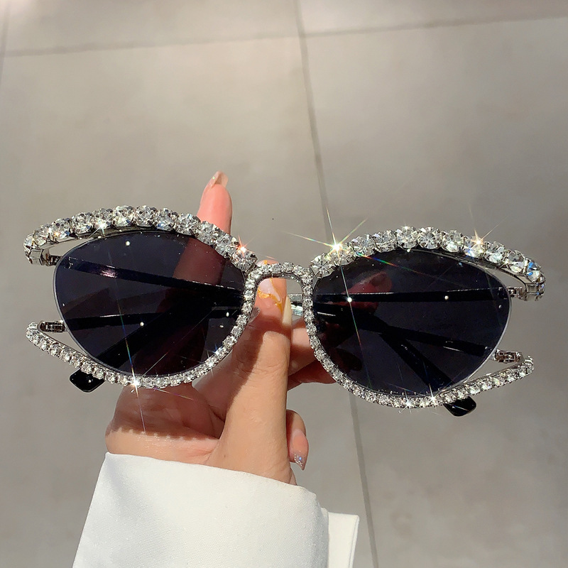 Men and women's hot personality hollowed-out cat-eye diamond sunglasses Europe and the United States ins trend street shot network red with the s