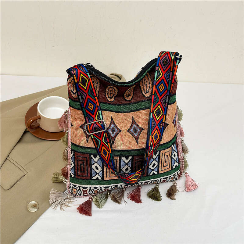 Large capacity Bohemian tassel 2024 new ethnic style hand-held tote ins single shoulder crossbody bag
