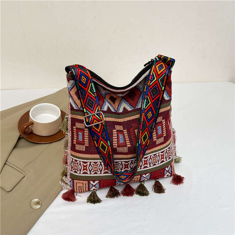 Large capacity Bohemian tassel 2024 new ethnic style hand-held tote ins single shoulder crossbody bag